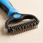 Close up of the stainless steel teeth on the pet deshedding brush