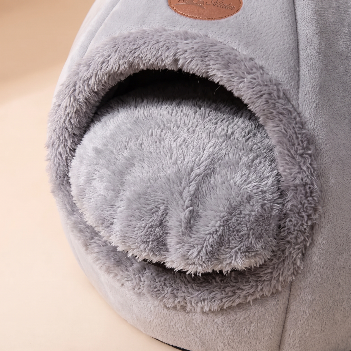 Removable plush cushion of the Cosy Enclosed Cat Cave Bed