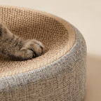 Close up of the woven sisal top and linen outer wall of the oval cat scratcher bed